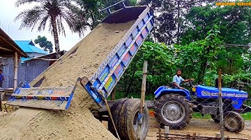 Sand is being load to be unload by the digital hydraulic facility system facility. Tractor Vision 16
