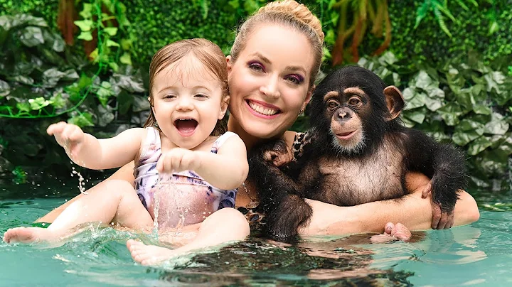 BABY CHIMPS HANGS OUT WITH A TWO YEAR OLD ON NIGHT...