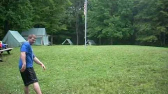 Jon playing football barefoot
