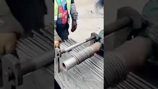 Rotating machine transforming the iron rods into round shape 😯#shorts
