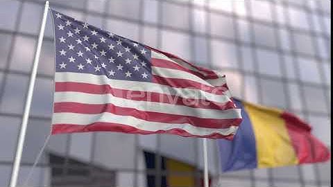 Flying Flags of the USA and Romania in Front of a Skyscraper | Motion Graphics - Envato elements