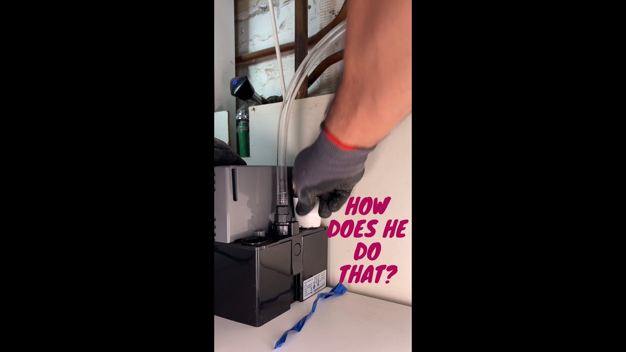 A plumber shows how to connect a condensate pump