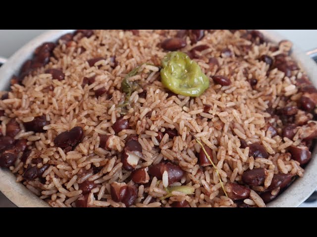 HOW TO MAKE JAMAICAN RICE PEAS | CARIBBEAN RICE u0026 PEAS class=