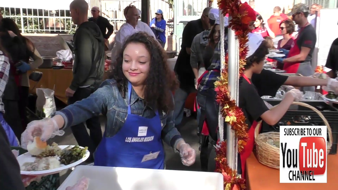 Kayla Maisonet giving Thanksgiving Dinner to the homeless at LA Mission in Los Angeles