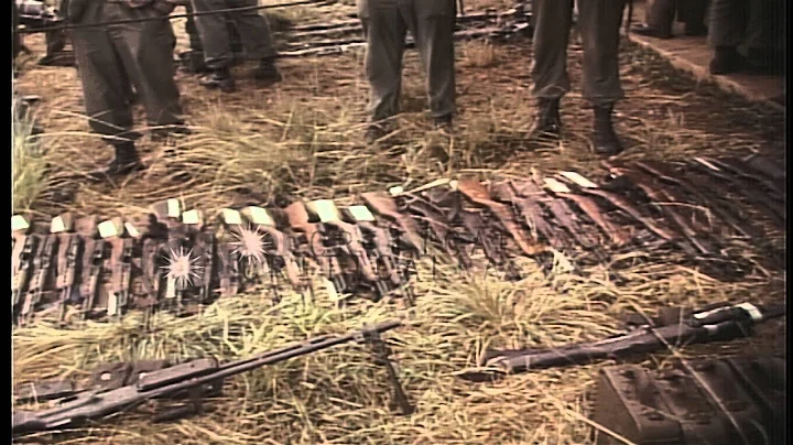 US 1st Air Cavalry Division soldiers display captured Vietcong weapons and ammuni...HD Stock Footage
