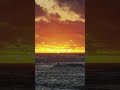 GREEN FLASH Sunset Video with Surfer going by! No edits, filter, or manipulation in any way.