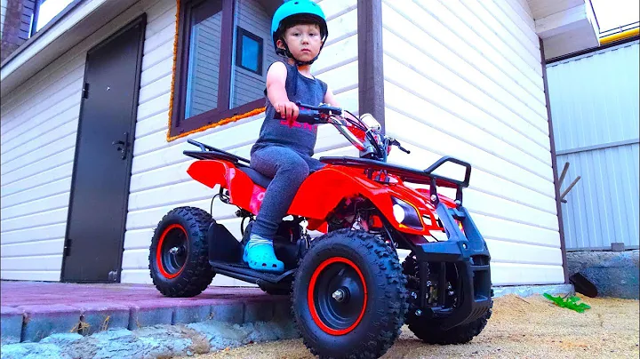 Senya and unpacking an ATV for children