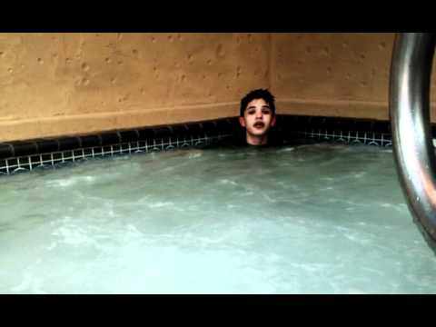 Antonio being sexy in a hot tub.