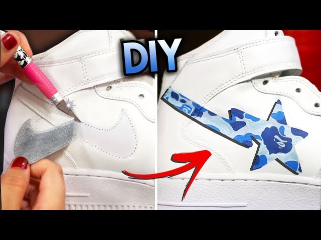 Custom Air Force 1s with light blue and navy 3D Nike Swoosh