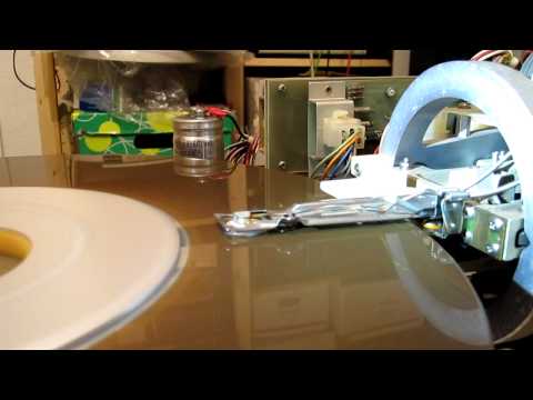 Naked RK05F vintage hard disk -- still moving (3/3)