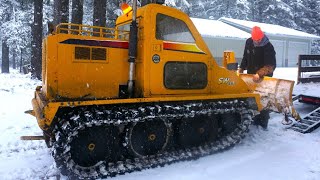 Plowing Deep Snow In a Blizzard With a Bombardier Tank