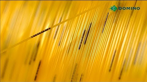 High speed ring marking on optical fibres with CIJ technology by Domino Industrial.