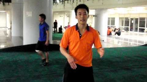 How to do a jump outside 540 kick. Professional wushu style.