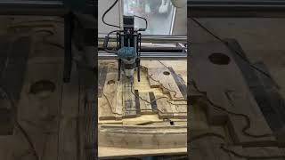 Cutting out two Florida wall hangers made from bourbon barrel stave assemblies using my CNC router.