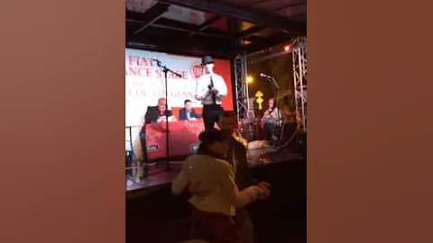 Charlie Poveromo singing at the feast in Manhattan