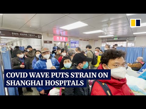 Shanghai hospitals overwhelmed as Covid cases spike