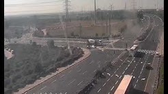 Traffic cam shows rocket hitting intersection in central Israel