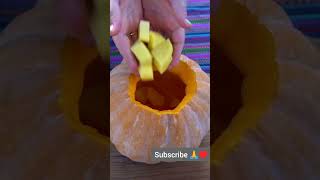 Cooking stuffed pumpkin by a professional chef in the heart of nature.shortvideo shorts