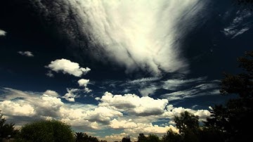 Excellent cumulus and cirrus clouds forming in pure blue sky timelapse V10091