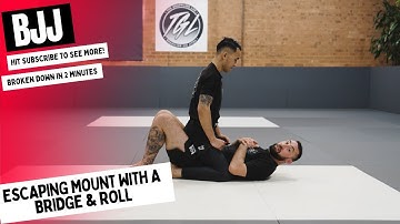 Escaping mount using the bridge and roll. - The Grappling Lab
