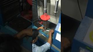 Helical compression spring test