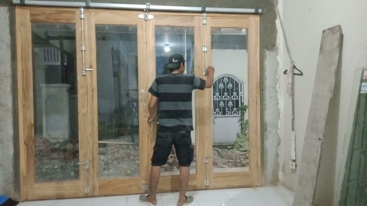 pintu rumah minimalis lide lipat kayu jati idaman#pintugarasilipat #modernfurniture