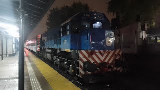 GM G22 A701 bajo la lluvia con el tren MITRE cortó Escobar a villa Ballester. llegando a Ballester