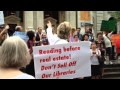 Reverend Billy choir goes to save the libraries from sale a