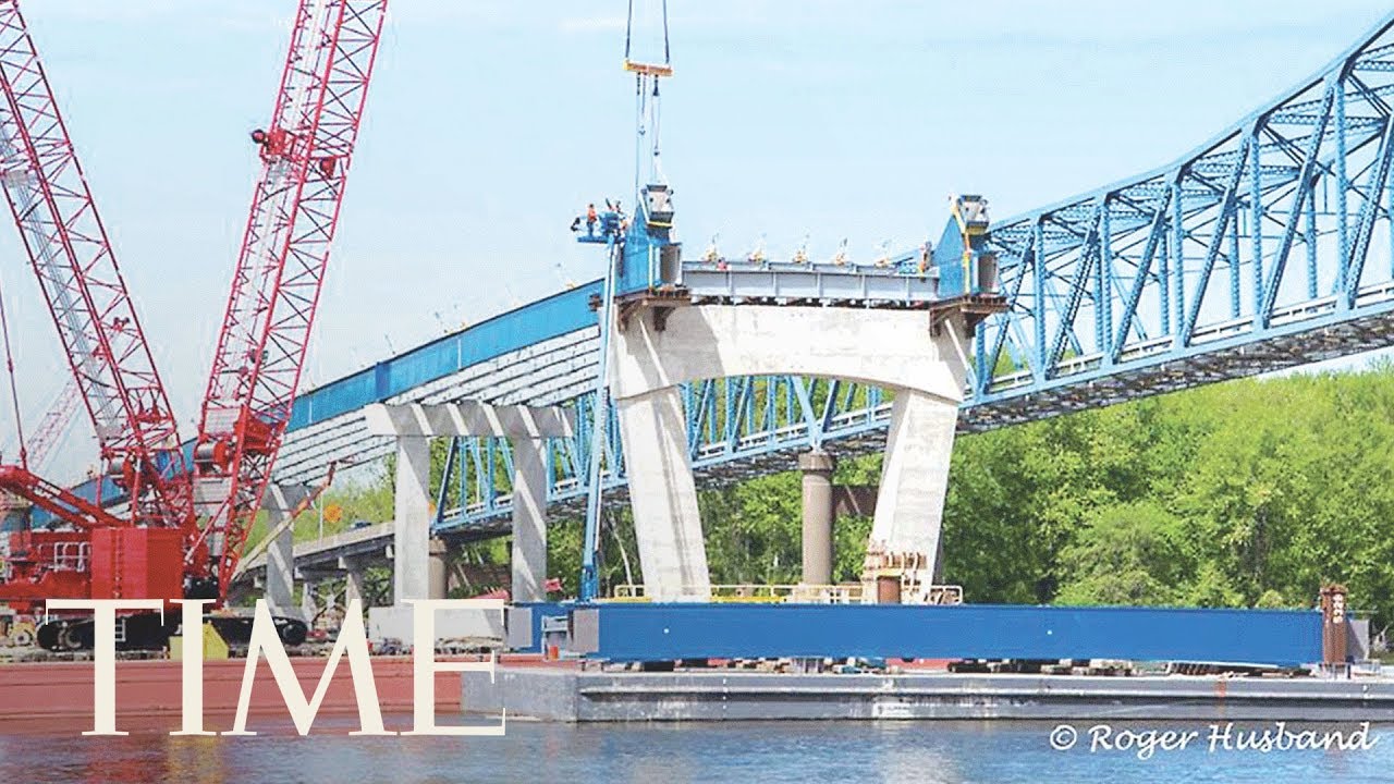 Watch The Savanna-Sabula Bridge Implode Over The Mississippi River Due To Safety Issues | TIME