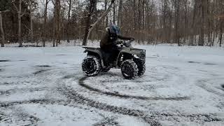 Doing Donuts in Snow on 4 Wheeler (Super Slow Mo)