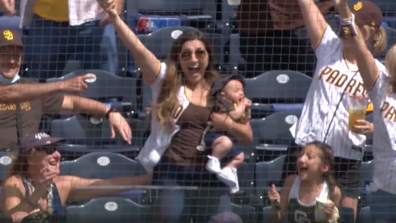 Mom catches foul ball WHILE HOLDING BABY! YouTube