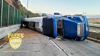Overturned tanker causes massive spill  two rotator recovery