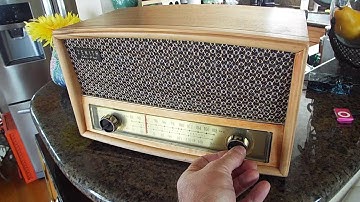 Zenith AM-FM radio, tube amplified playing an iPod through iPod adapter.