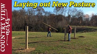 Laying out our new Pasture Fencing.  Setting first fence posts.