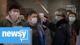 Coronavirus death toll exceeds SARS