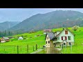 Driving in switzerland countryside  cloudy spring view of swiss