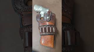 Colt Python Custom Leather Holster and a few more.