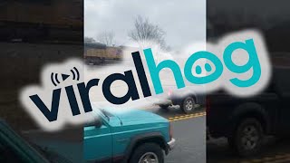 Stranded Truck Sliced in Two by Train || ViralHog