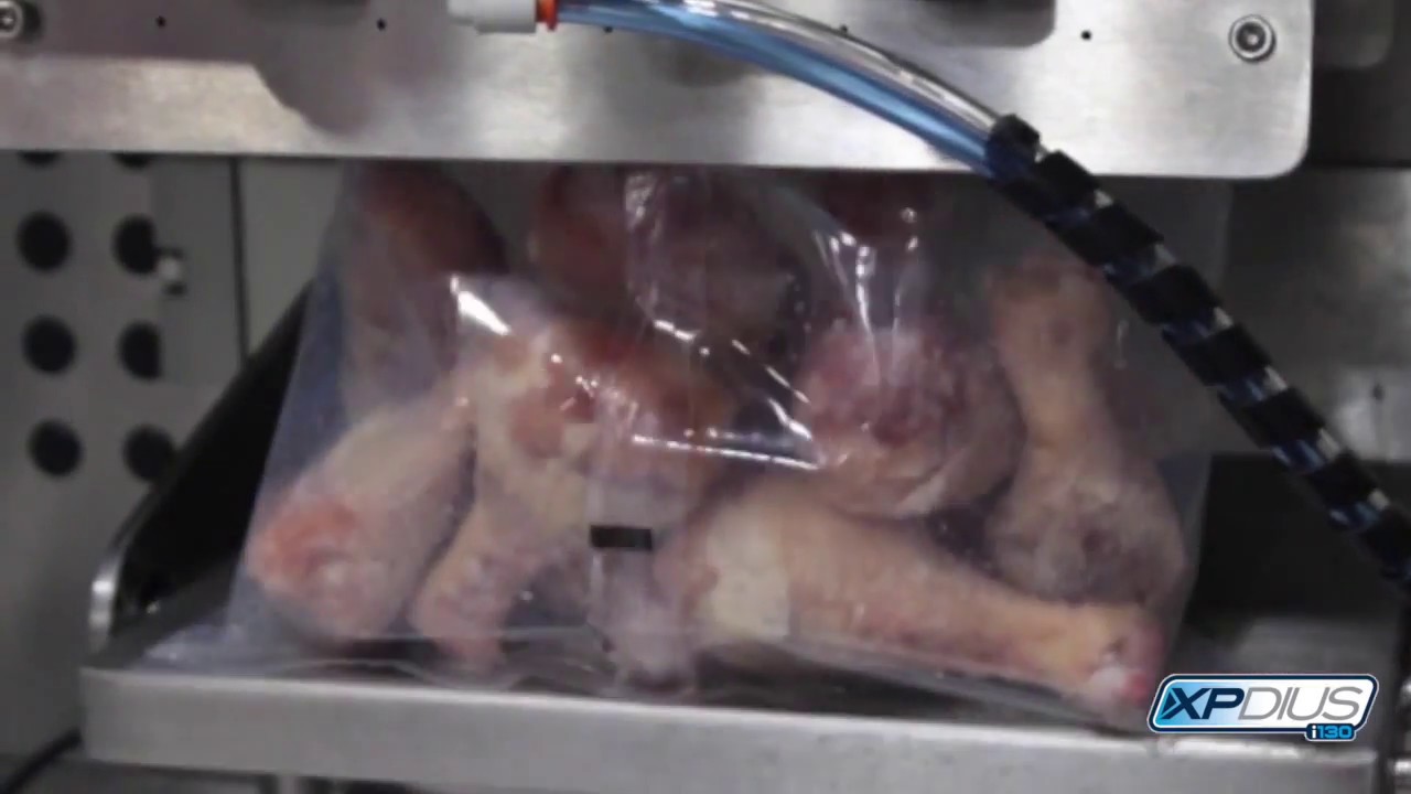 PrimoCombi with XPdius vertical form, fill & seal packaging frozen chicken legs and drum sticks