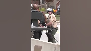 Protesters scuffle with police outside Illinois ICE facility