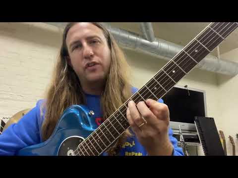 The Bar Chord Played and Explained for Guitar