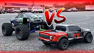 Traxxas Xmaxx VS Traxxas Raptor!!! Parking lot Bash! Round 2!