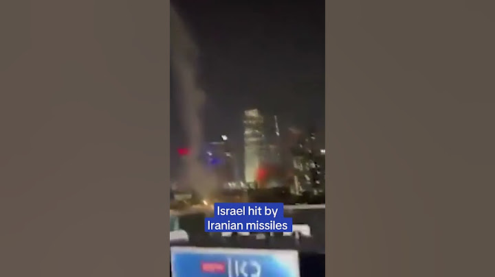 Israeli citizens react as Iranian missiles strike Tel Aviv