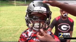 New helmets, techniques help football players avoid dangerous head-to-head collisions