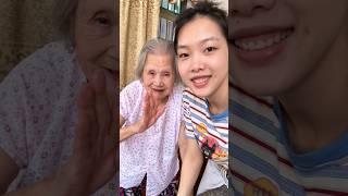 Grandma waves hello to camera with granddaughter, wait for her warm smile... #shorts