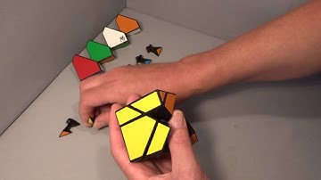 Tangram Cube puzzle disassembly and re-assembly (First look at mechanism)