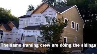 Watching a house being built--Roof shingles installed and (fiber cement) sidings started