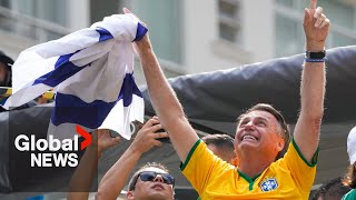 Former Brazilian president Bolsonaro holds rally, defends himself amid coup probe