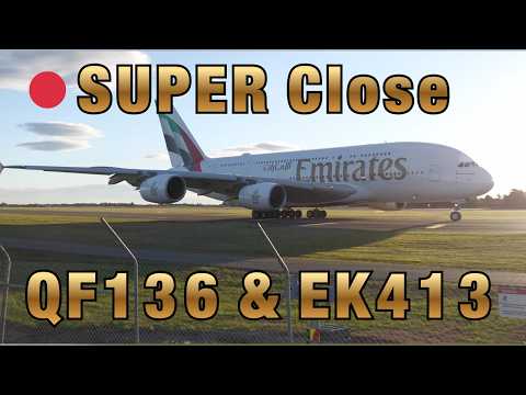How close?   Super close!! QF136 bound for Sydney & EK413 A380 bound for Dubai via Sydney