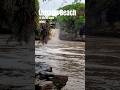"Uvongo Beach: Where Golden Sands Meet a Stunning Waterfall!"